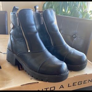 Women’s black leather boots. Zip up.
